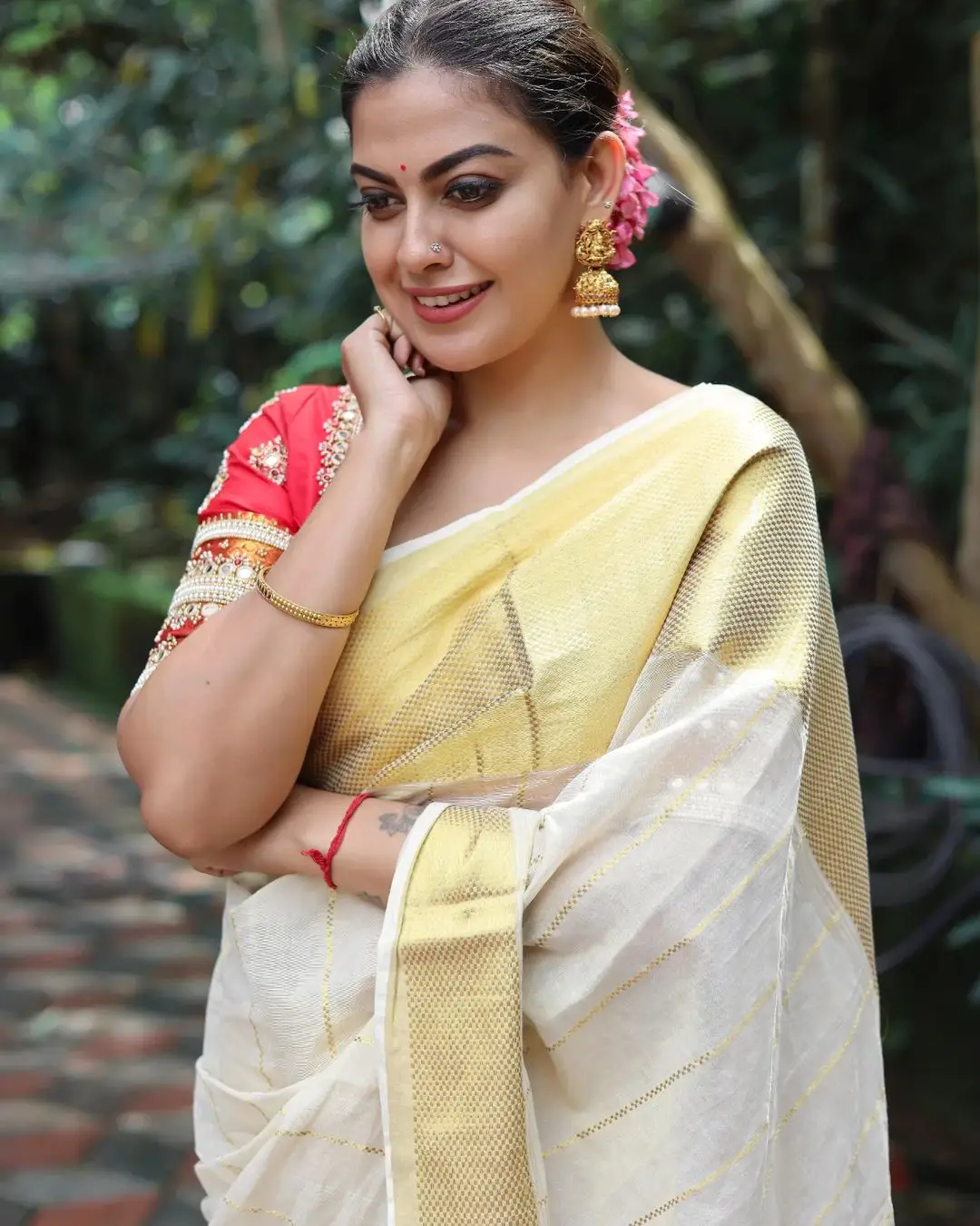 Indian Actress Anusree Nair in White Color Saree Red Blouse